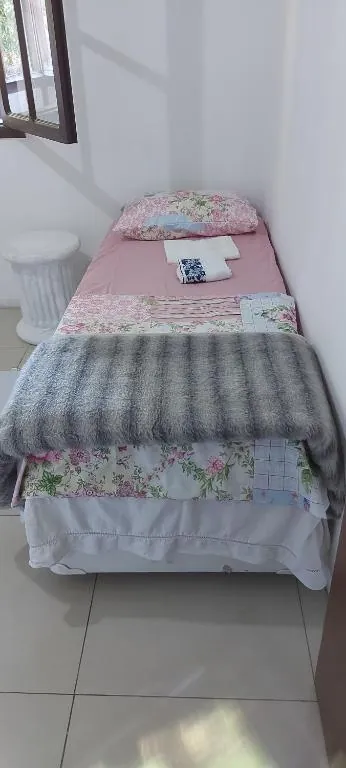 Camas de solteiro em quarto compartilhado